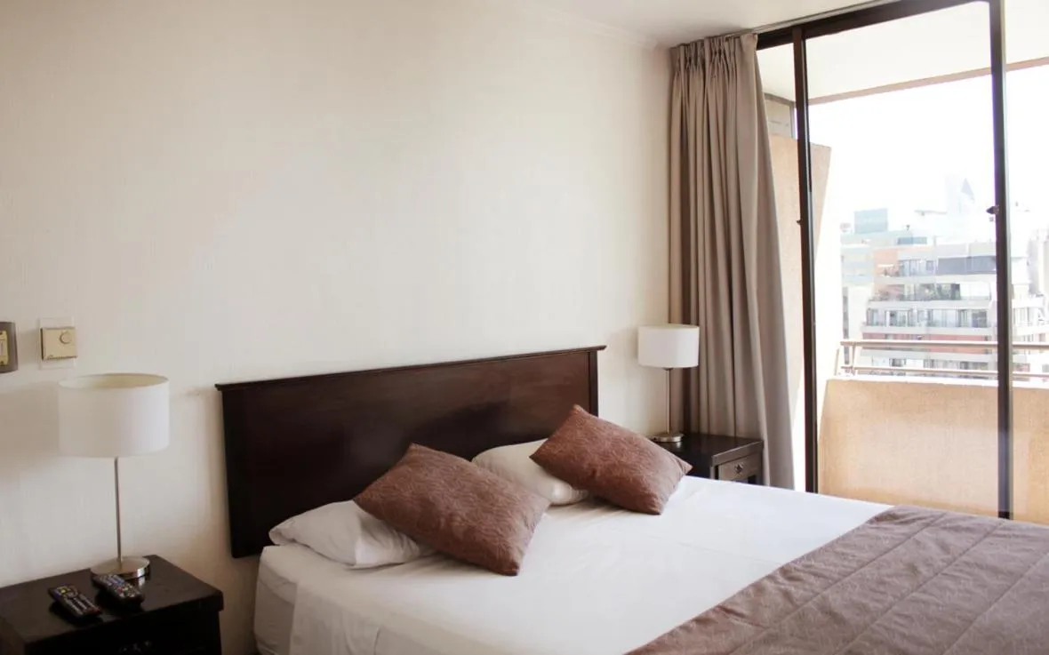 Bedroom, Bed in Apartamentos Costanera Centre