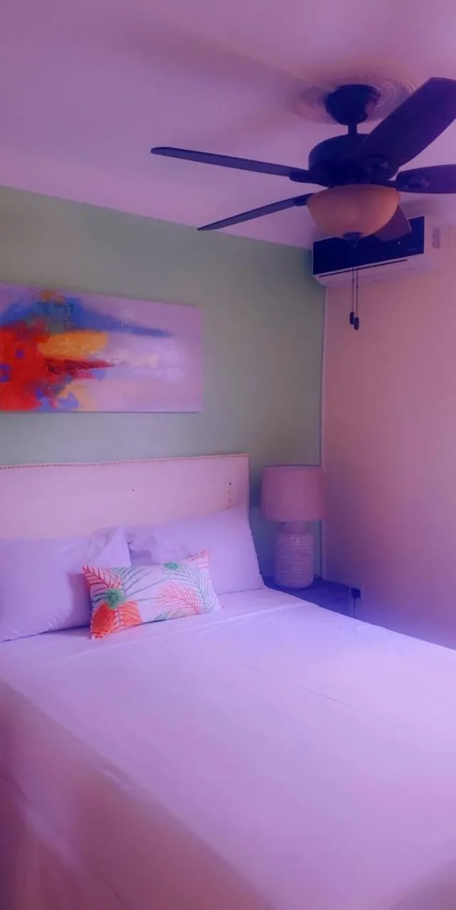 Bed in Sea Piton View Apartment- Location, Convenience, Modern Living
