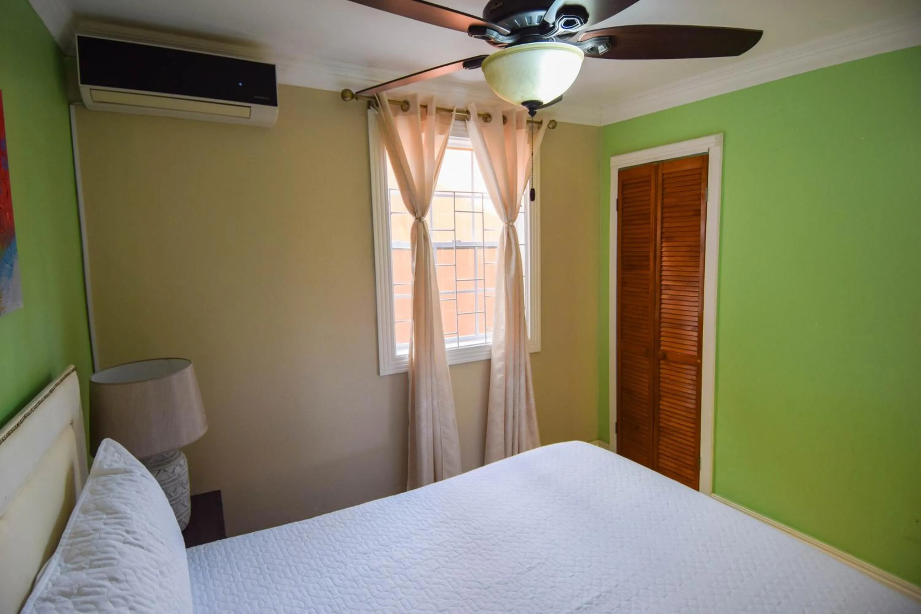 Bed in Sea Piton View Apartment- Location, Convenience, Modern Living