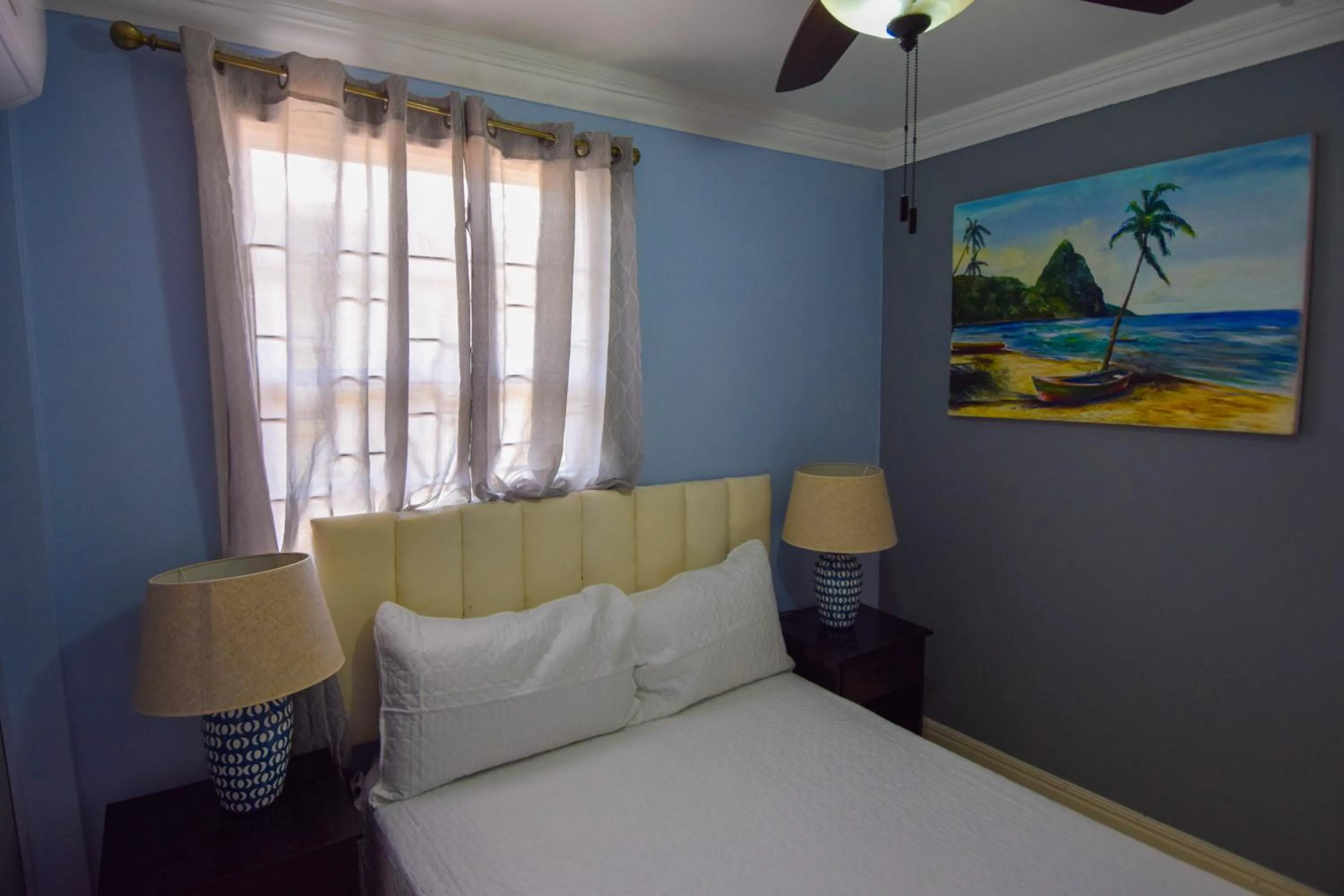 Bed in Sea Piton View Apartment- Location, Convenience, Modern Living