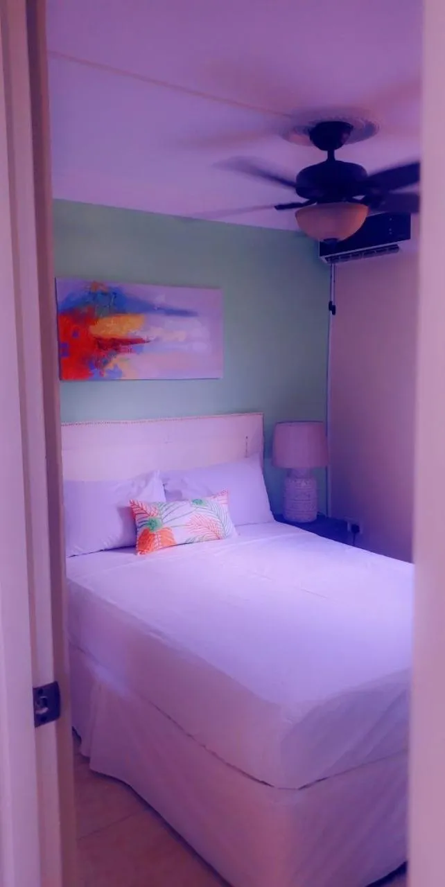 Bed in Sea Piton View Apartment- Location, Convenience, Modern Living