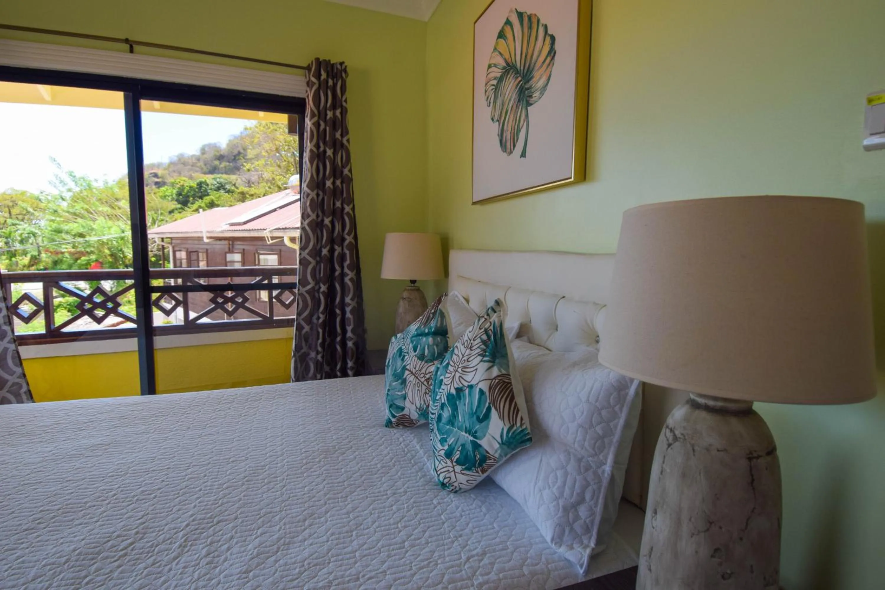 Bed in Sea Piton View Apartment- Location, Convenience, Modern Living