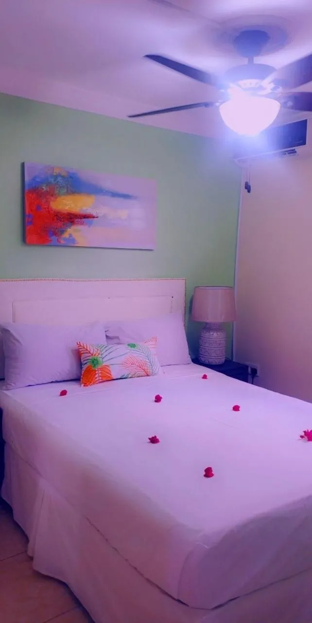 Bed in Sea Piton View Apartment- Location, Convenience, Modern Living