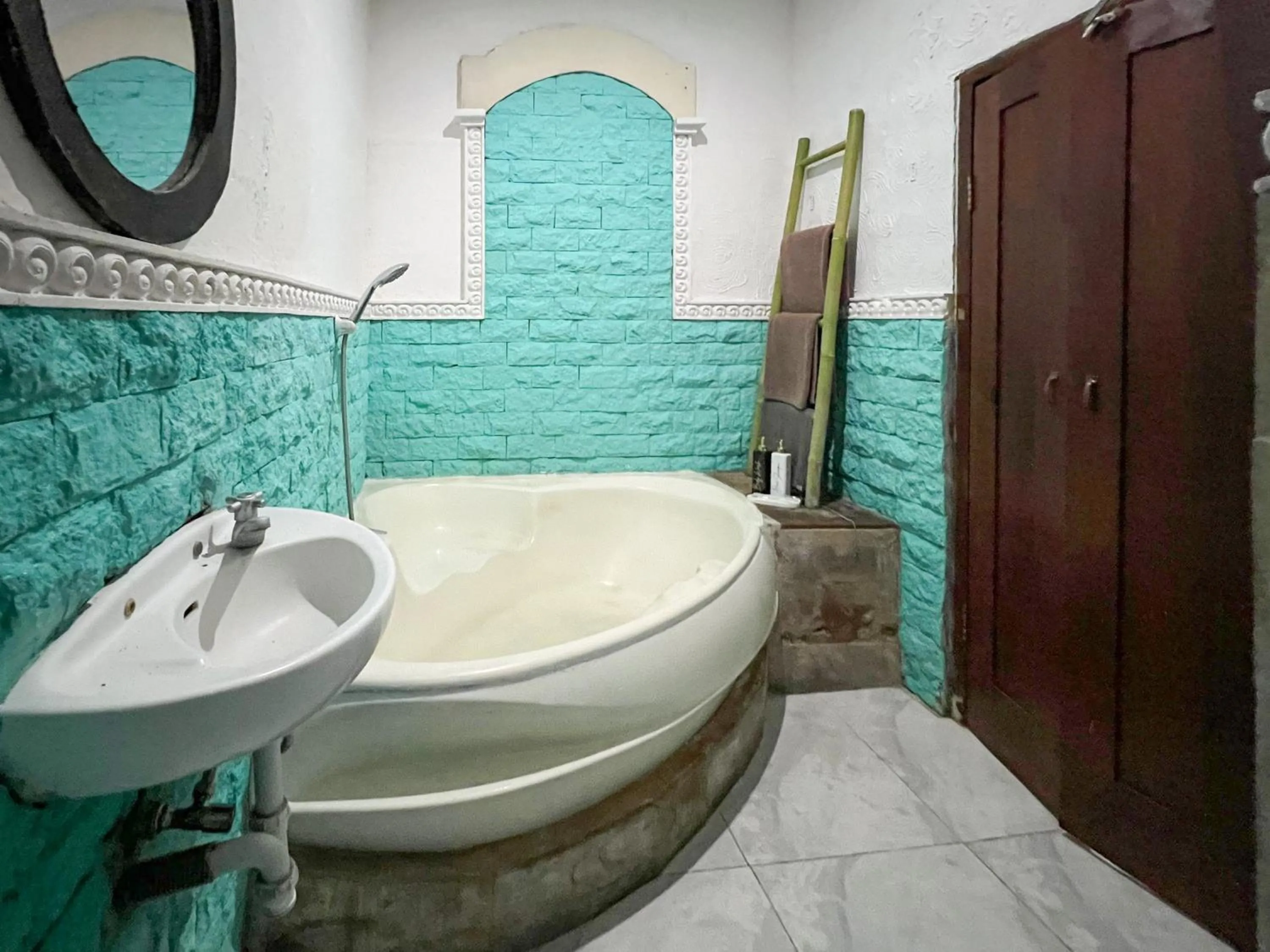 Bathroom in The Lavana Natasya Kuta Beach