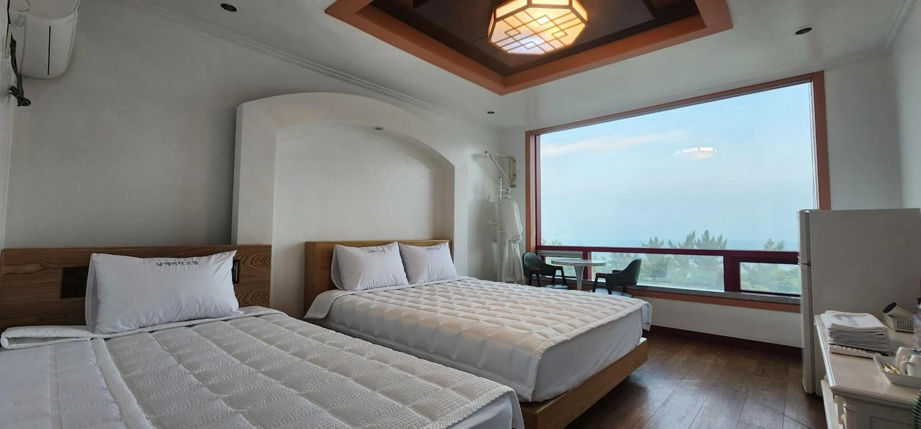 Bed in Namhae Beach Hotel