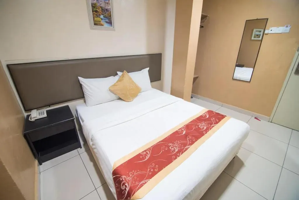 Bed in SohoTown Hotel