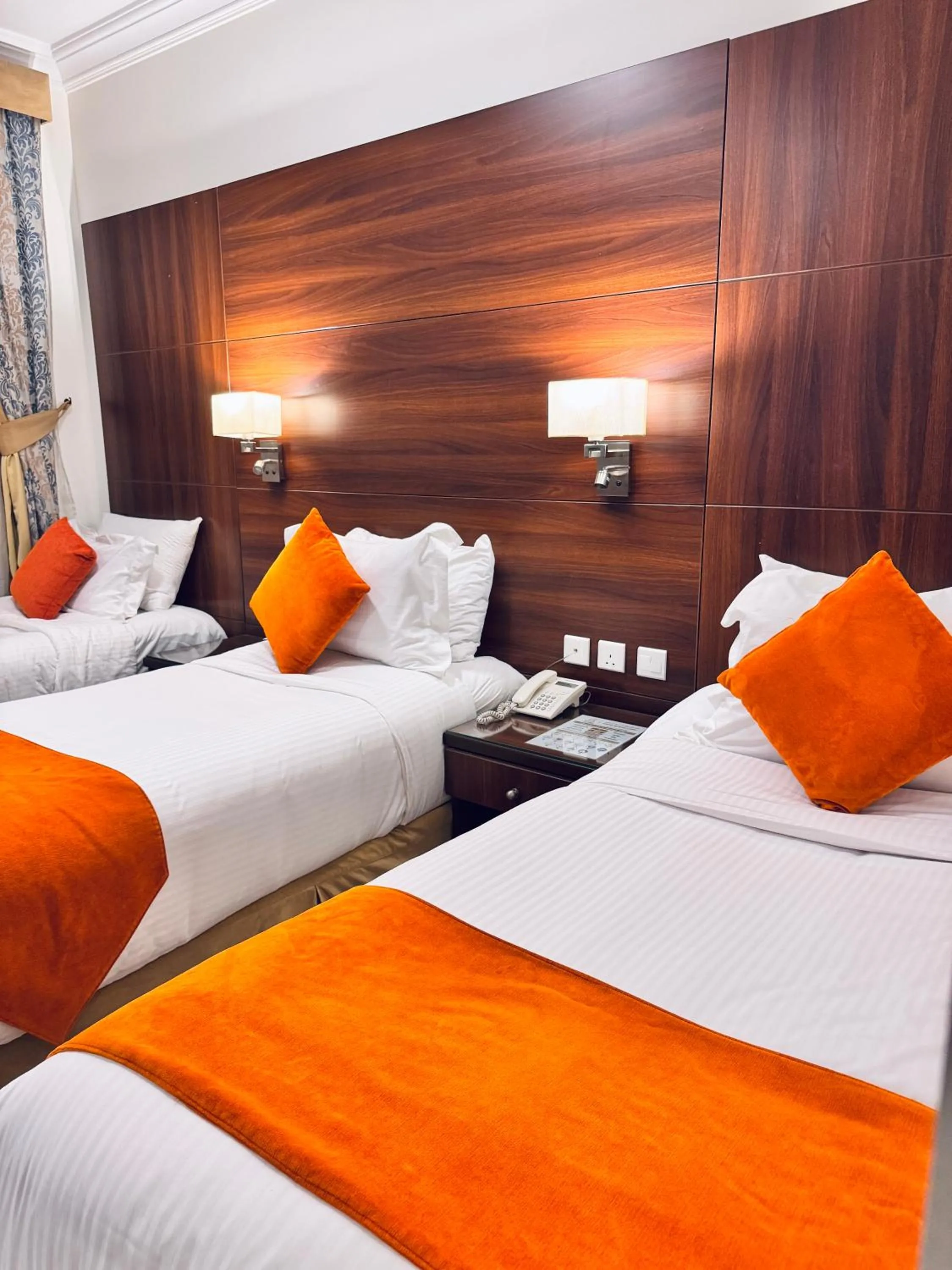 Bed in Rowaa Lindy Hotel Makkah