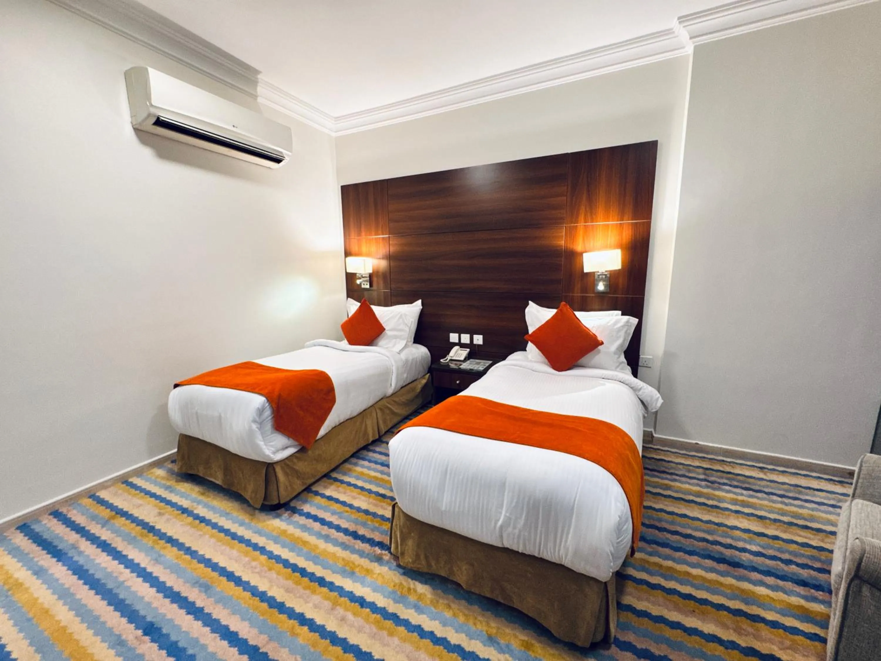 Bed in Rowaa Lindy Hotel Makkah