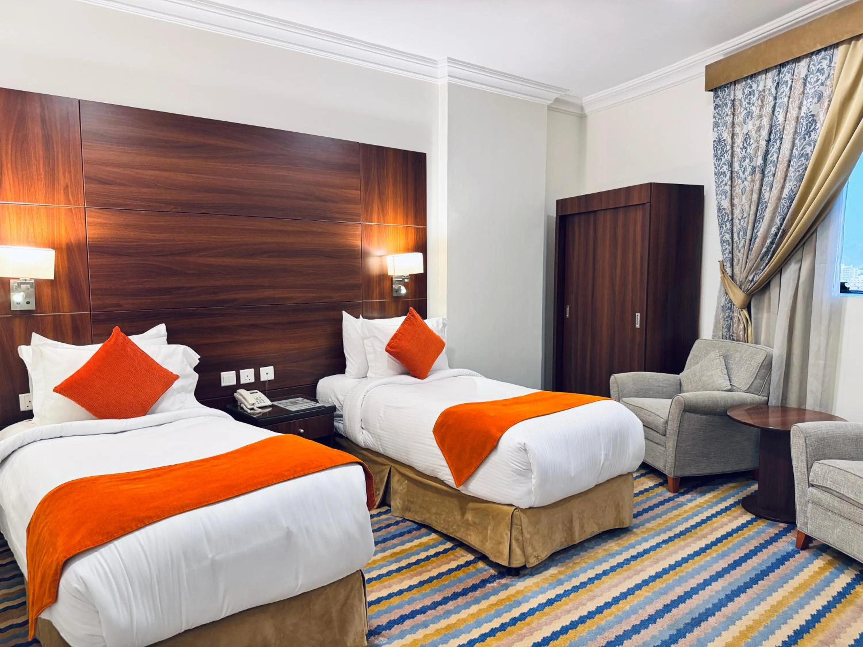 Bed in Rowaa Lindy Hotel Makkah