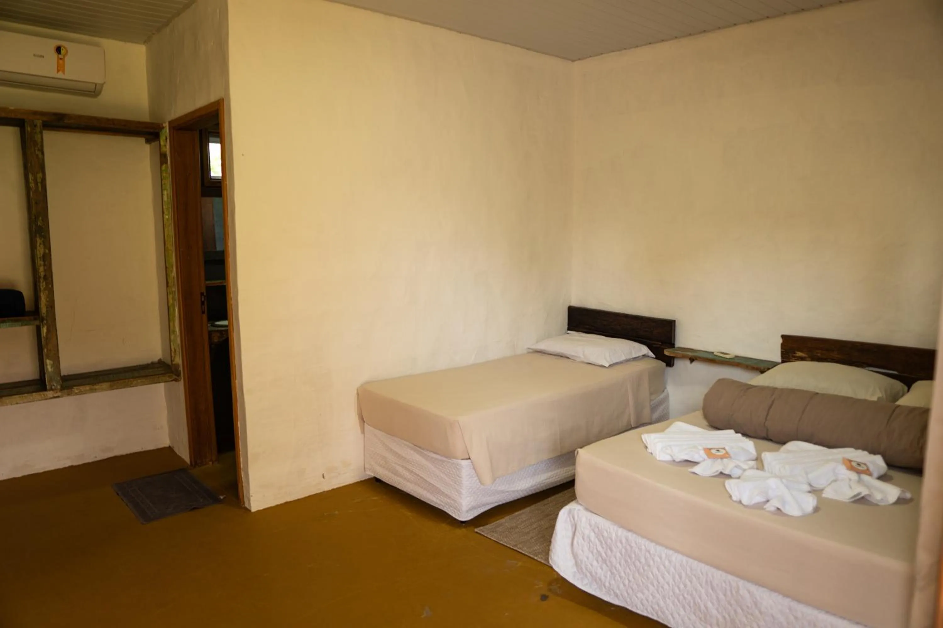 Photo of the whole room, Bed in Pousada Aracuã