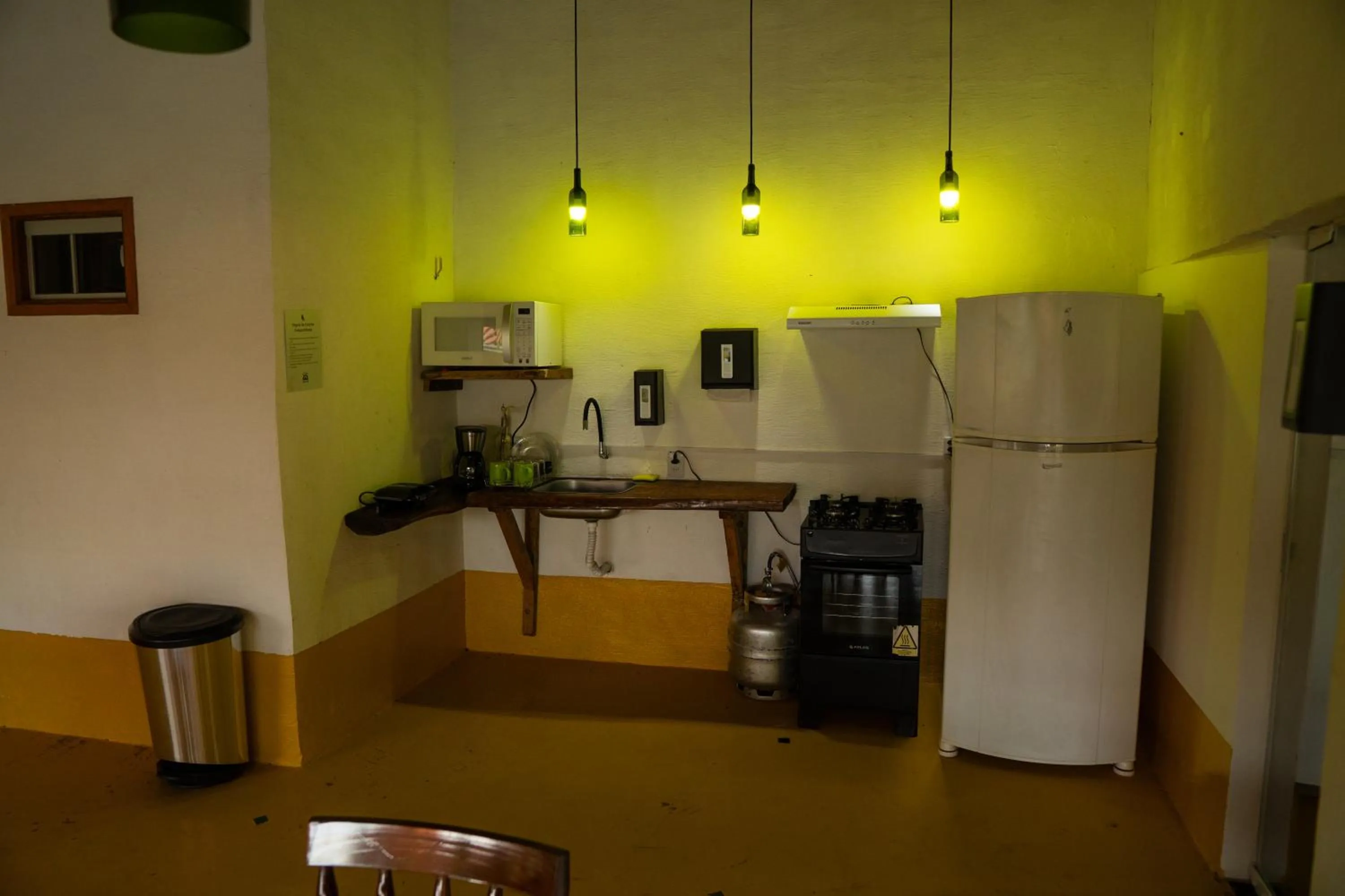 Kitchen or kitchenette in Pousada Aracuã