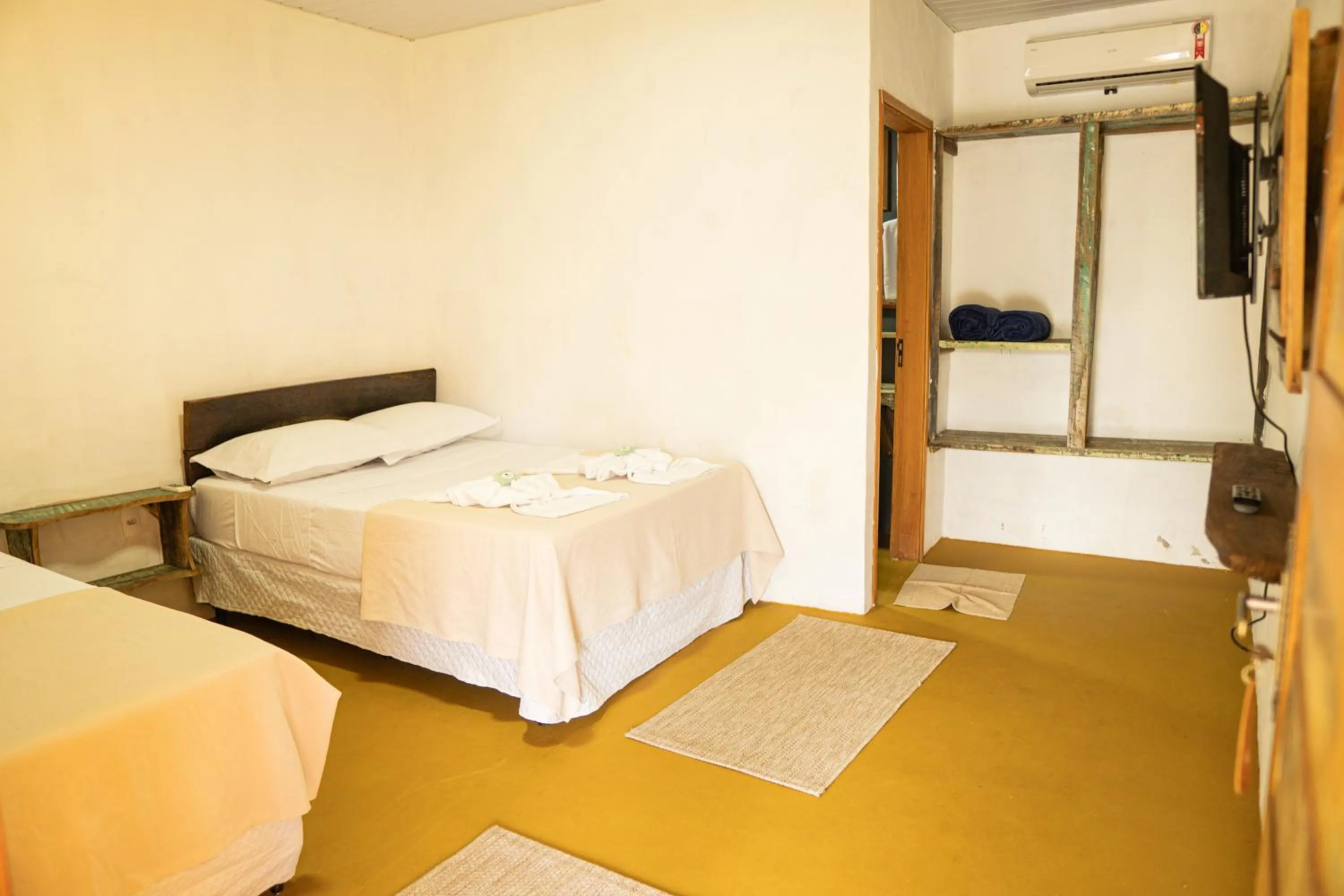 Photo of the whole room, Bed in Pousada Aracuã