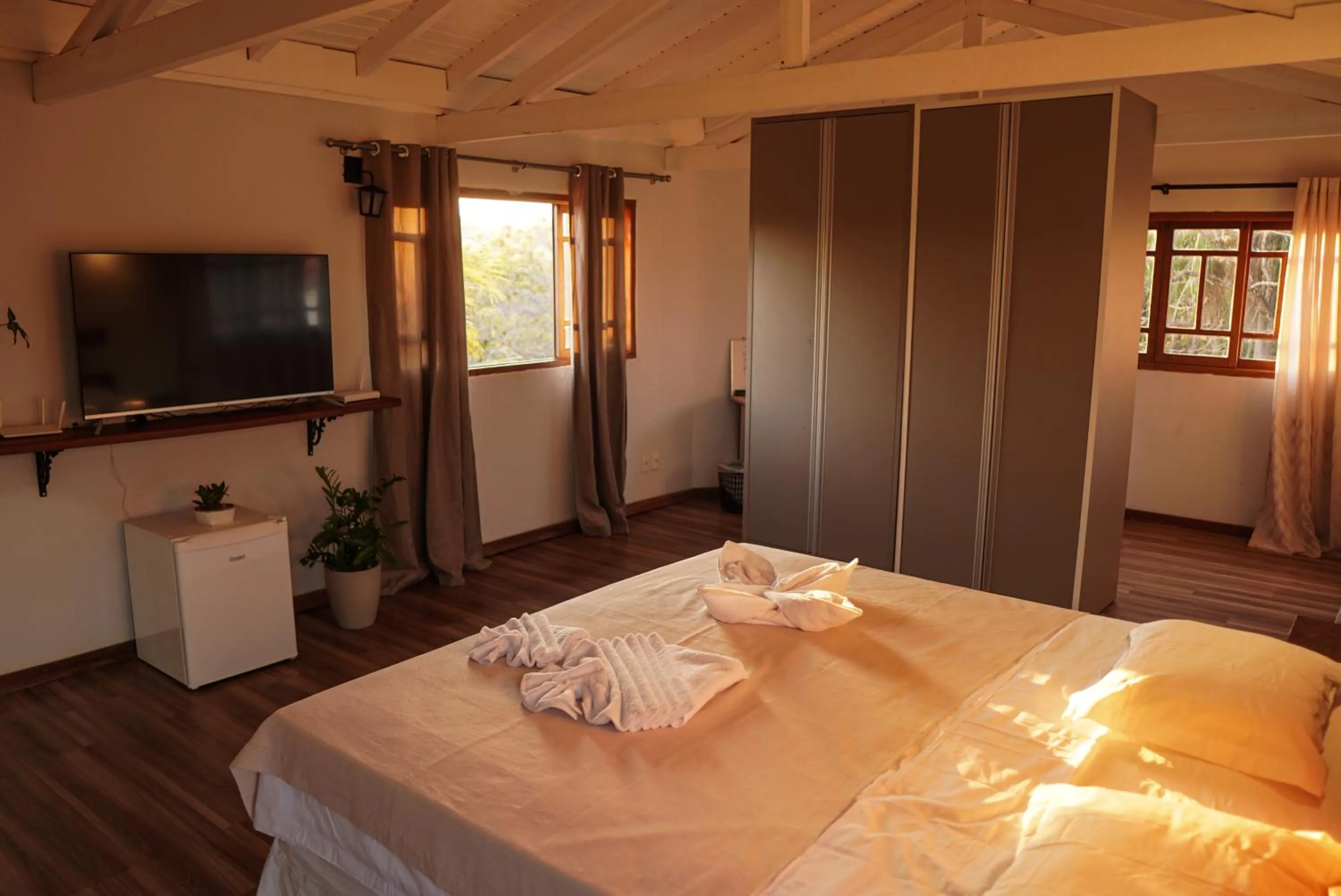 Bed in Pousada Aracuã