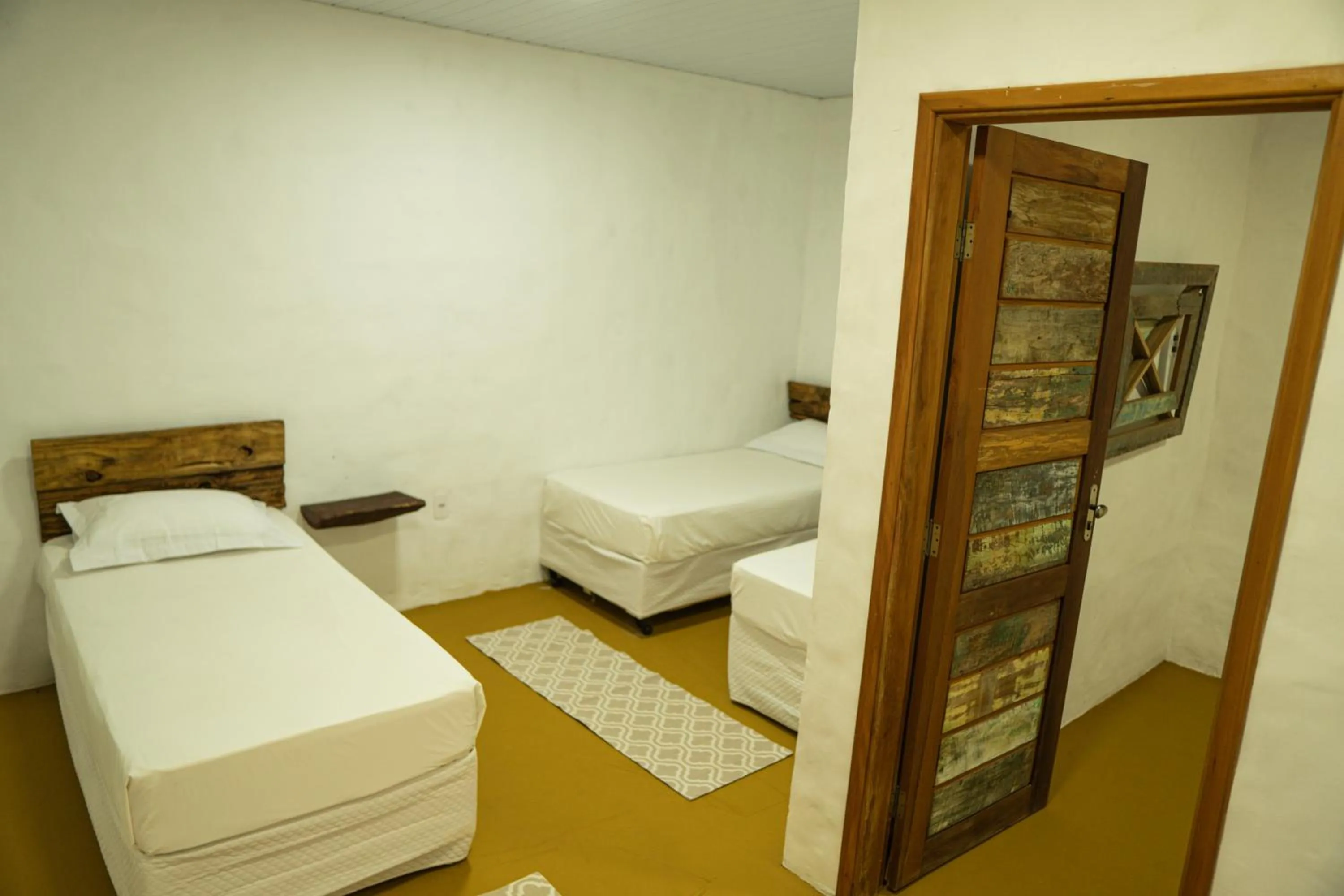 Photo of the whole room, Bed in Pousada Aracuã