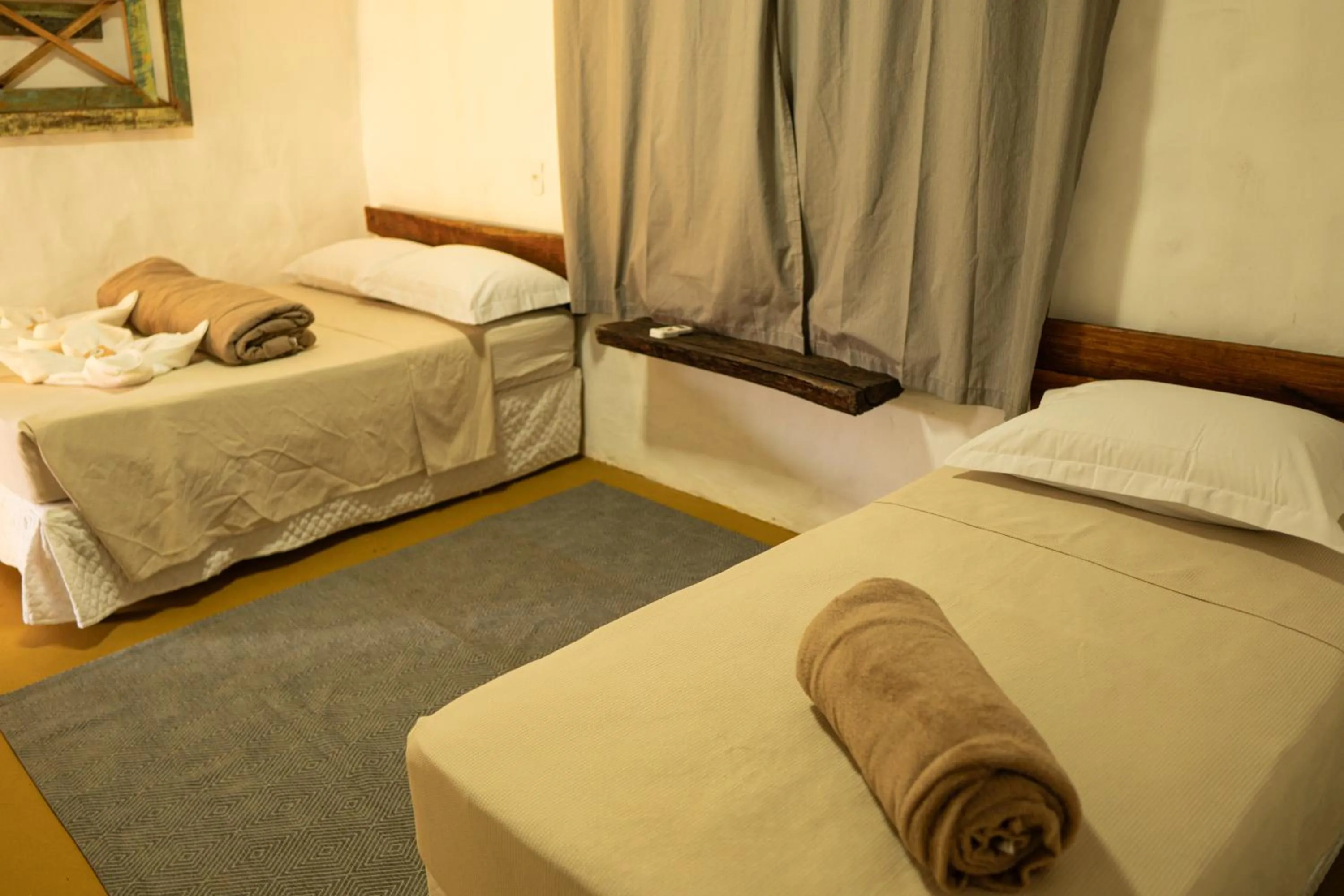 Photo of the whole room, Bed in Pousada Aracuã