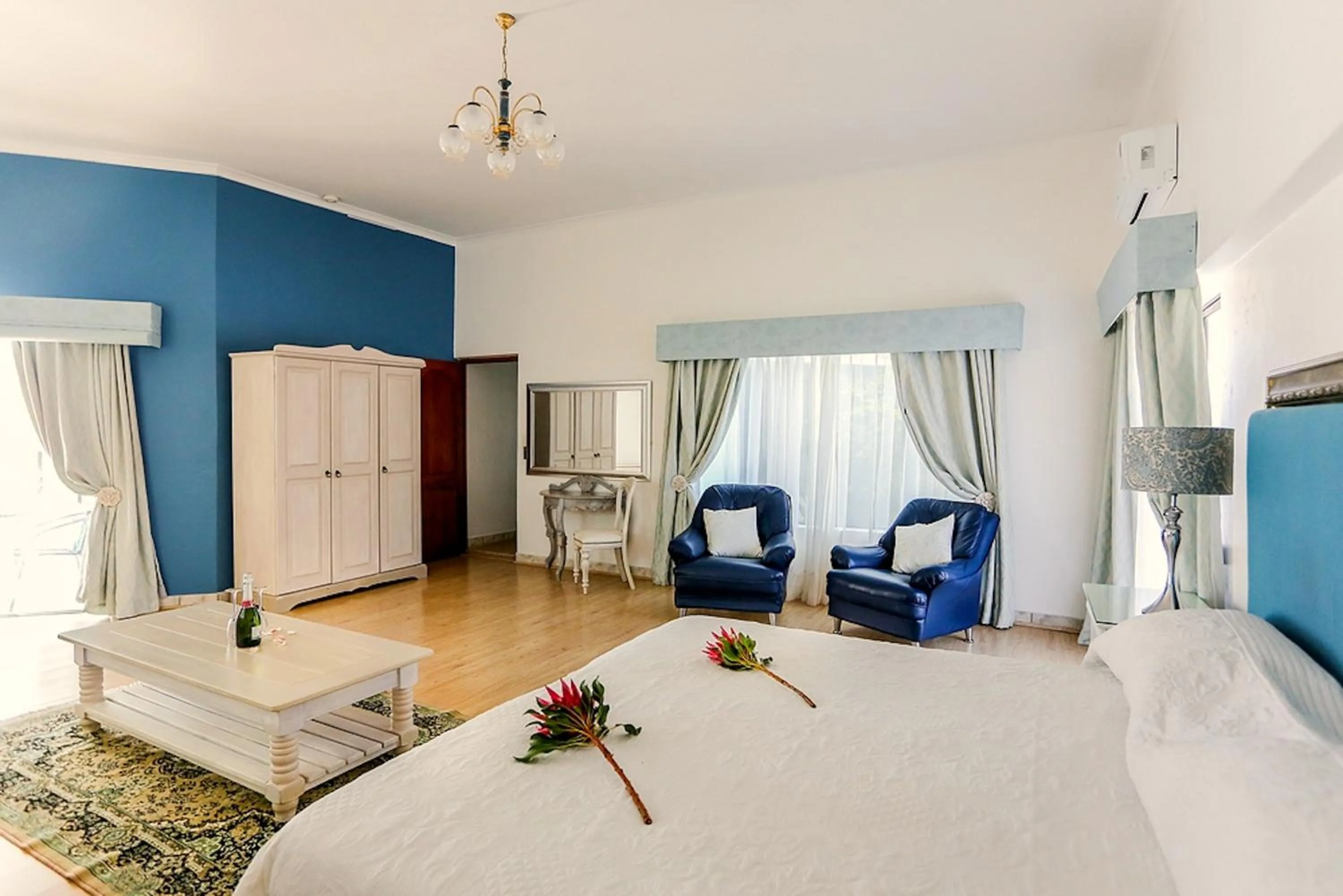 Seating area, Bed in Misty Waves Boutique Hotel