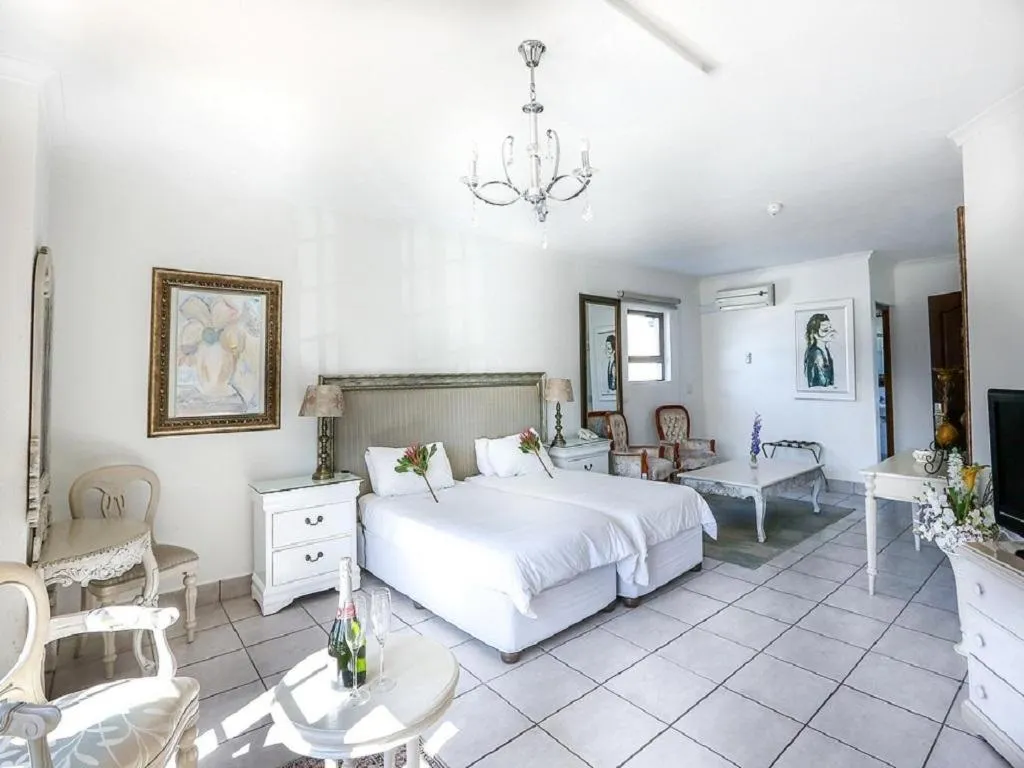 Bed in Misty Waves Boutique Hotel