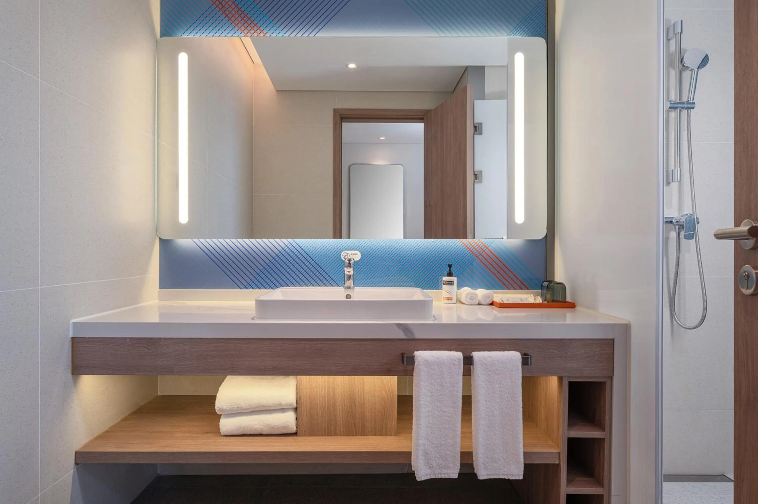 Bathroom in Holiday Inn Express Chongqing Liangjiang Yufu by IHG