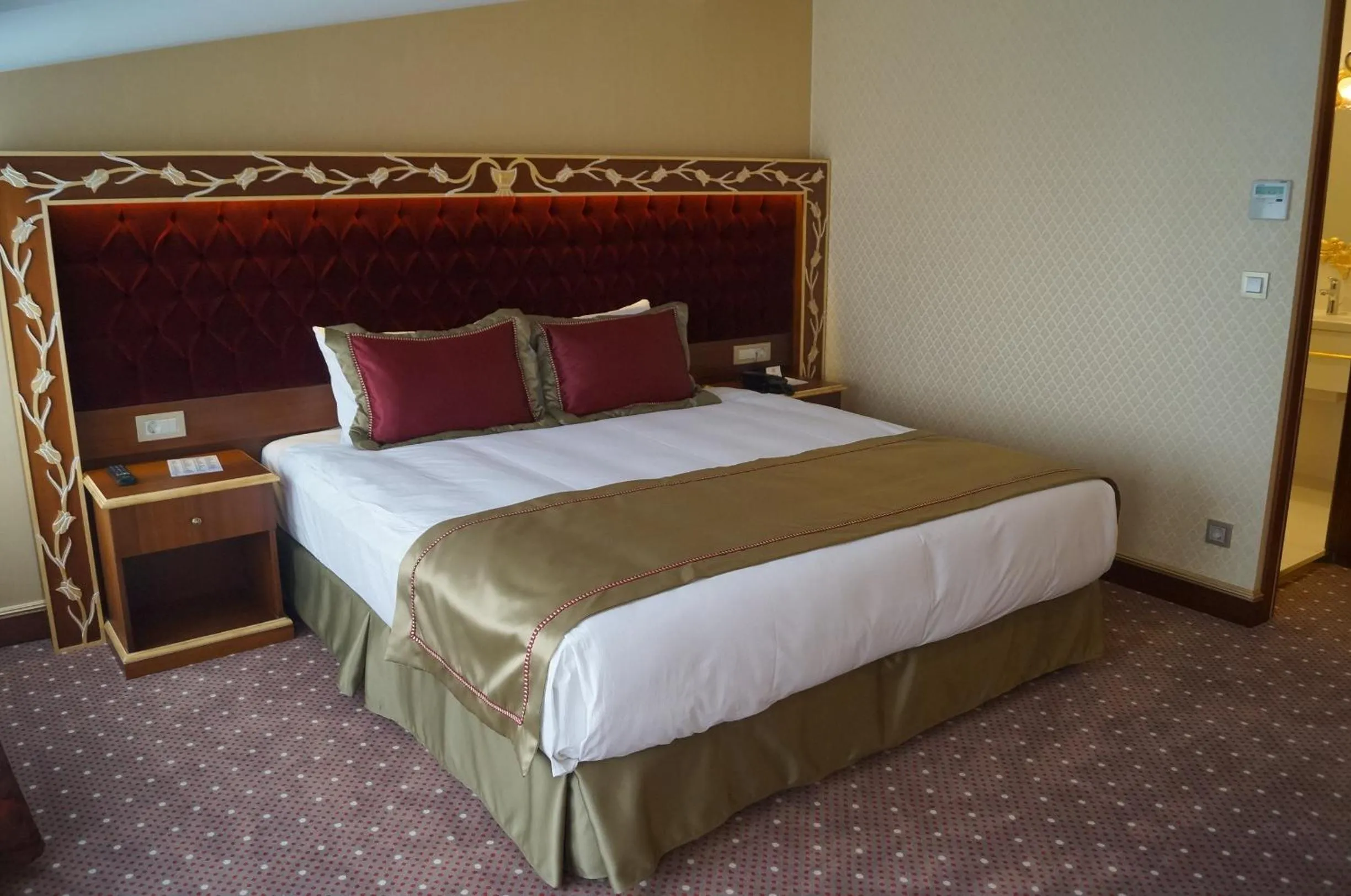 Bed, Room Photo in MB Deluxe Hotel