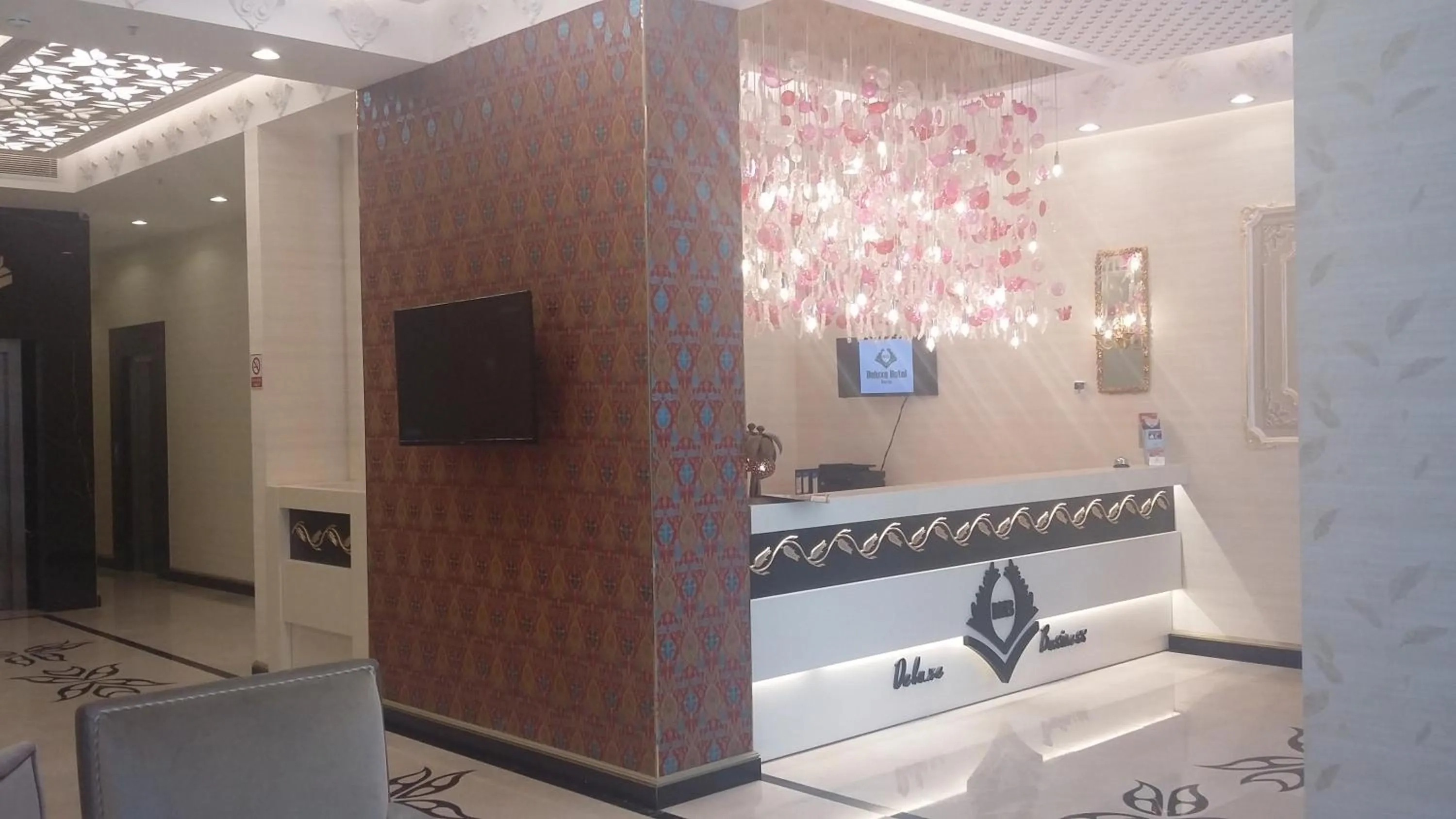 Lobby or reception in MB Deluxe Hotel