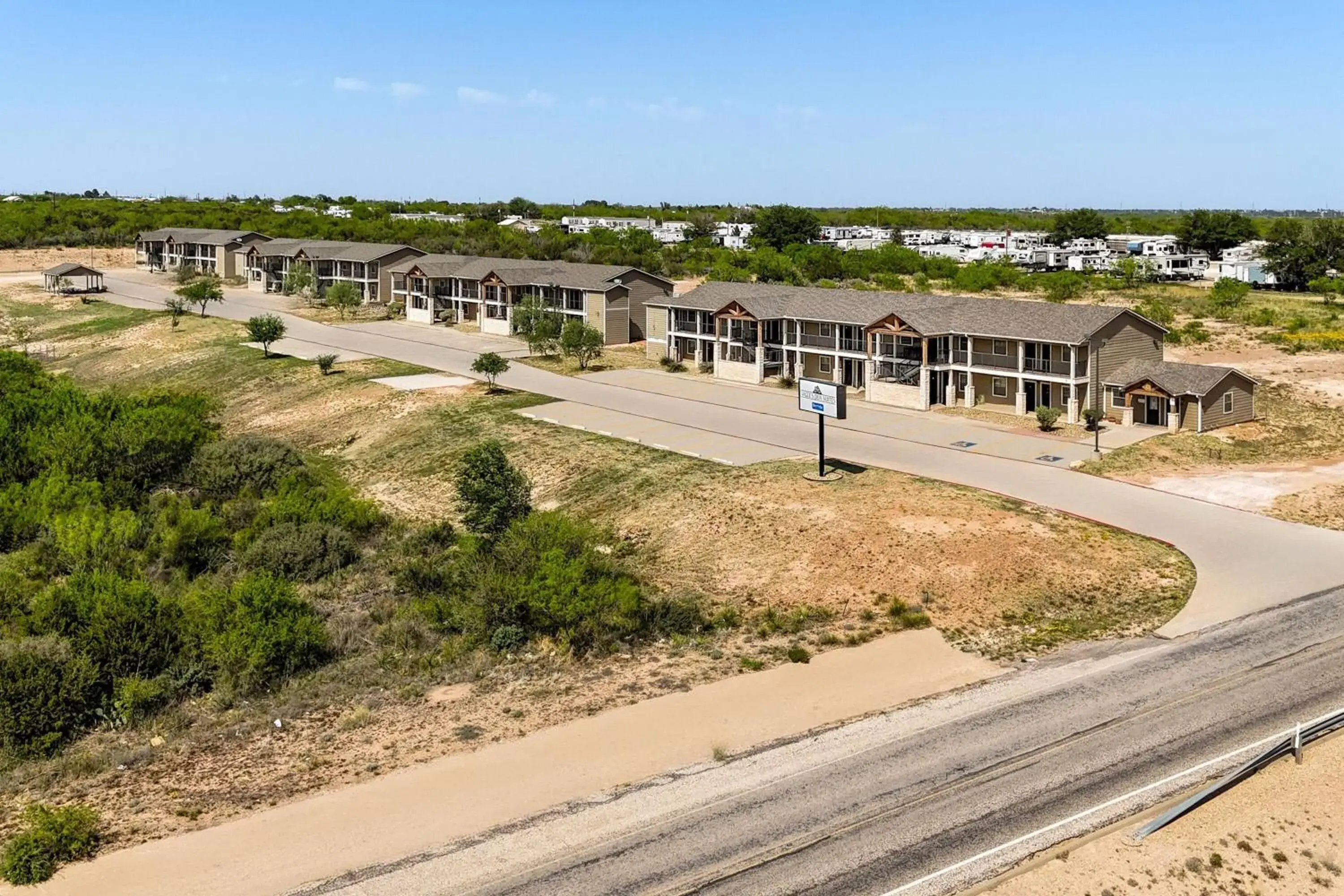 Property building in Eagle's Den Suites Big Spring a Travelodge by Wyndham Property building in Eagle's Den Suites Big Spring a Travelodge by Wyndham