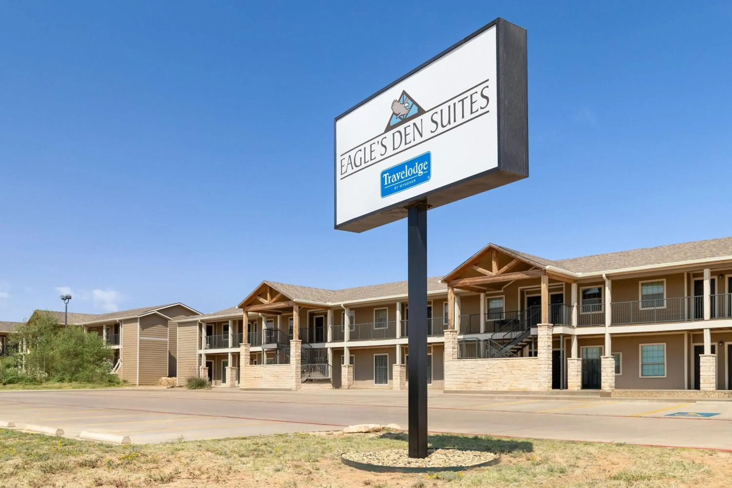 Property building in Eagle's Den Suites Big Spring a Travelodge by Wyndham Property building in Eagle's Den Suites Big Spring a Travelodge by Wyndham