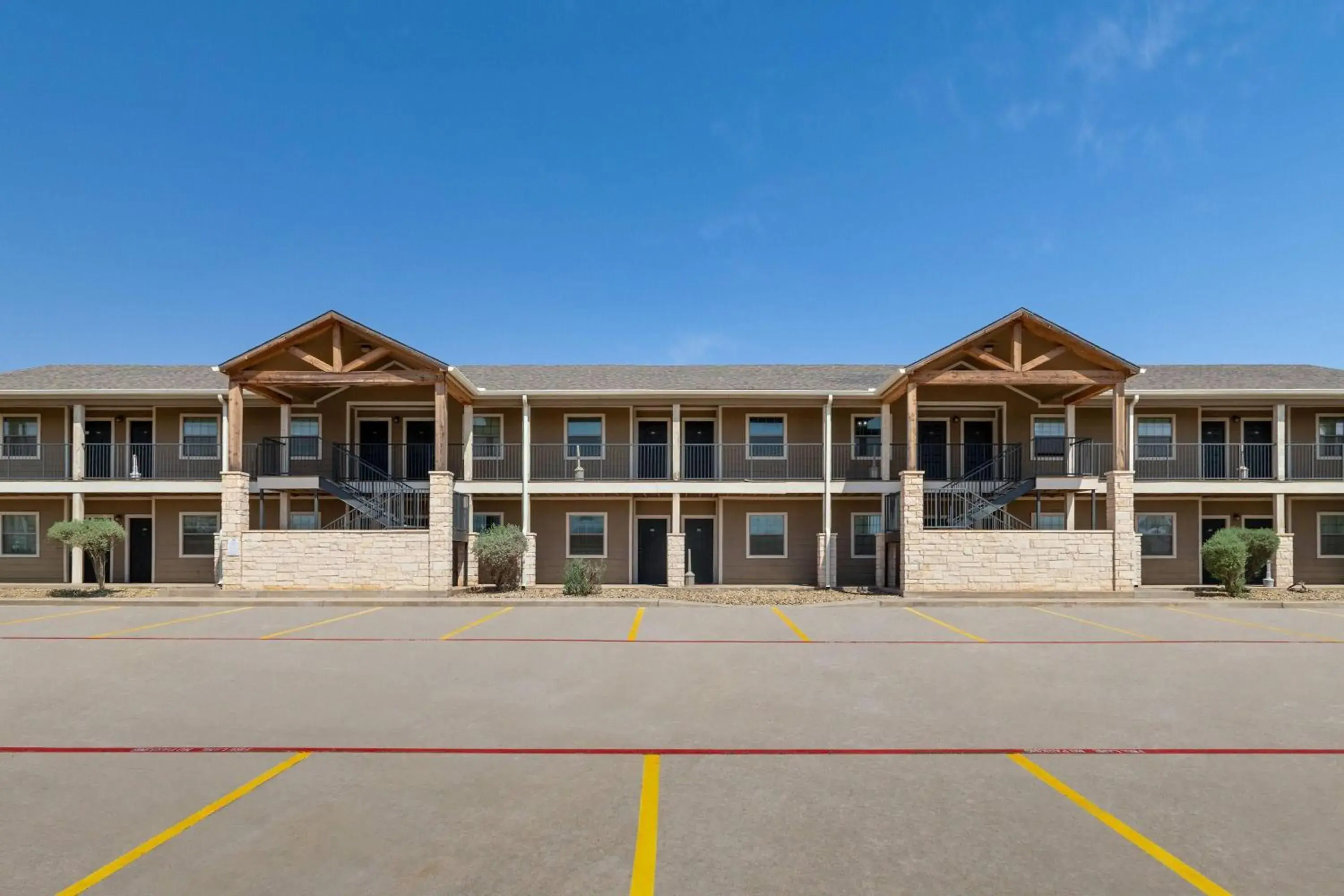 Property building in Eagle's Den Suites Big Spring a Travelodge by Wyndham Property building in Eagle's Den Suites Big Spring a Travelodge by Wyndham