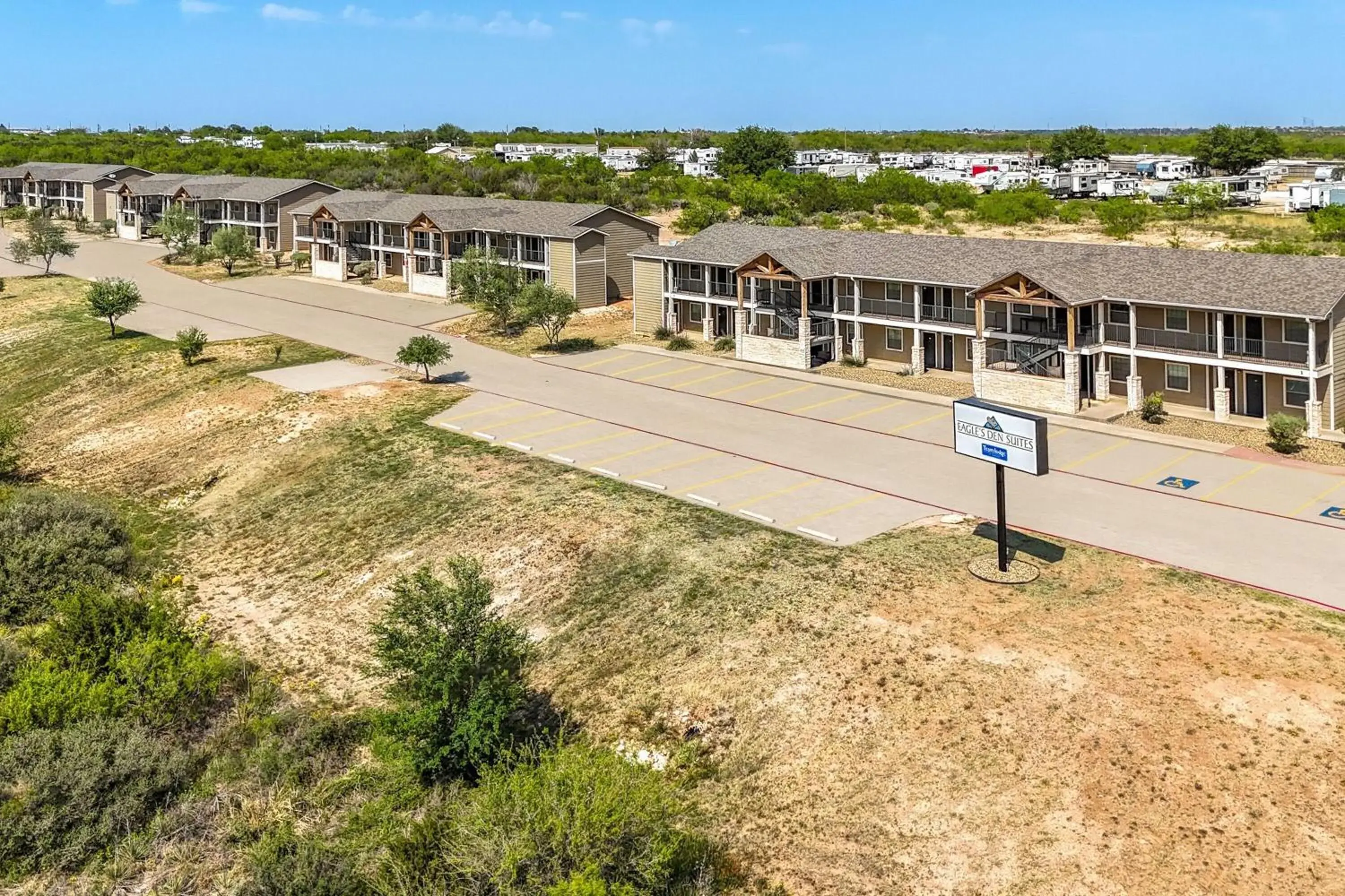 Property building in Eagle's Den Suites Big Spring a Travelodge by Wyndham Property building in Eagle's Den Suites Big Spring a Travelodge by Wyndham