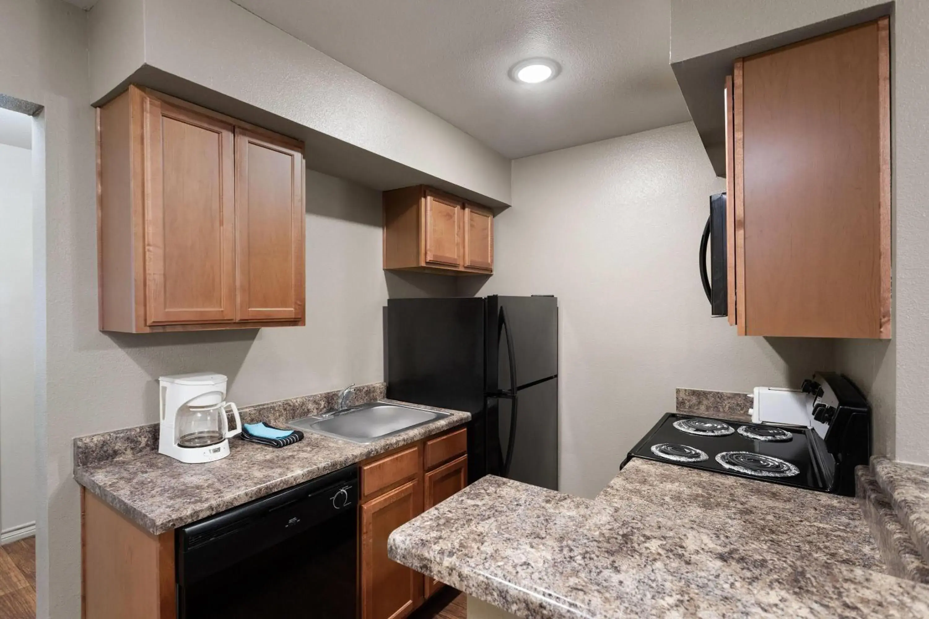 Photo of the whole room in Eagle's Den Suites Big Spring a Travelodge by Wyndham Photo of the whole room in Eagle's Den Suites Big Spring a Travelodge by Wyndham