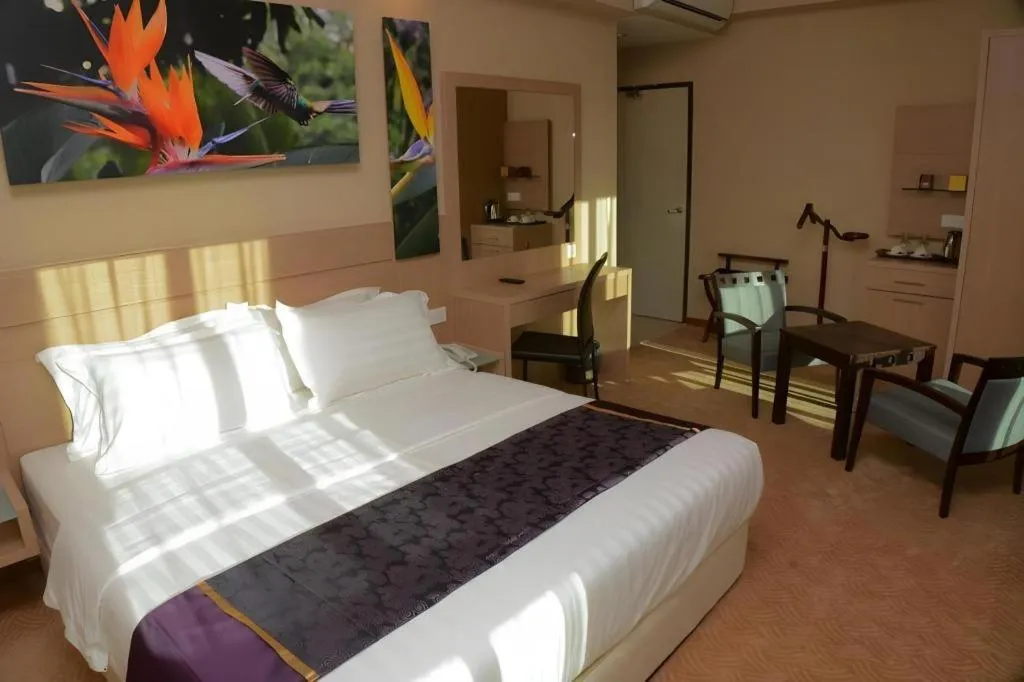 Bed in The Garden Boutique Hotel