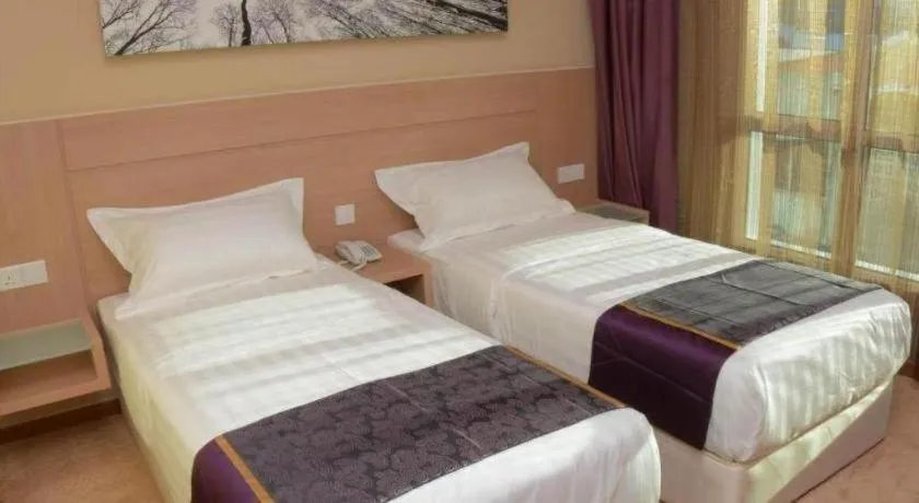 Bed in The Garden Boutique Hotel