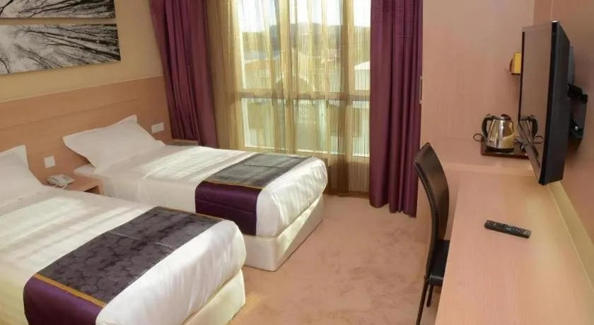 Bed in The Garden Boutique Hotel