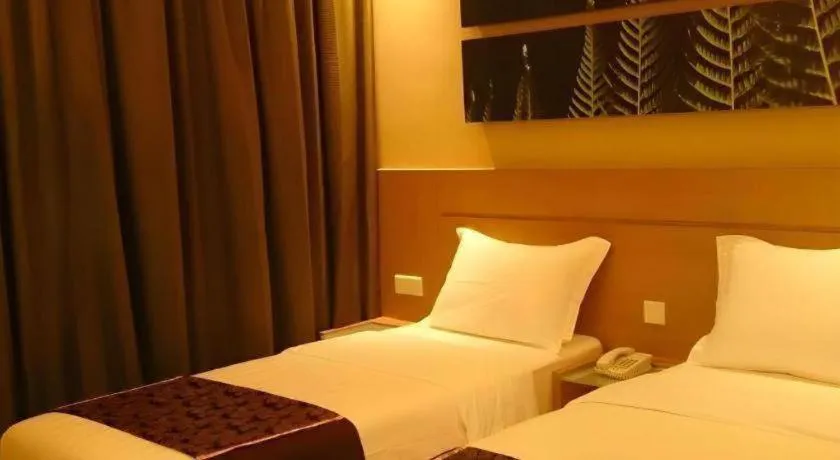 Bed in The Garden Boutique Hotel