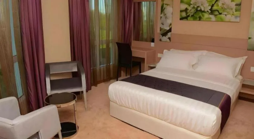 Bed in The Garden Boutique Hotel