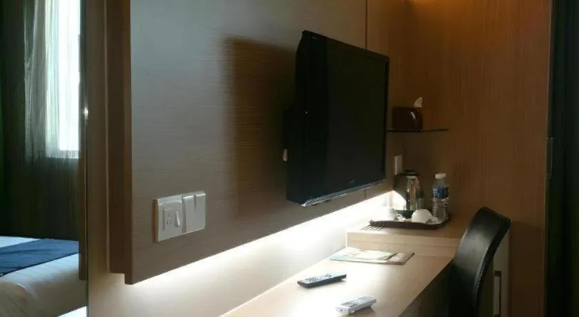 Bed in The Garden Boutique Hotel