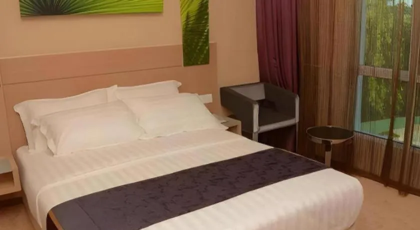 Bed in The Garden Boutique Hotel