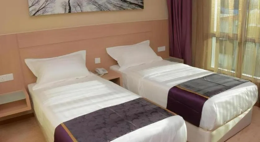 Bed in The Garden Boutique Hotel