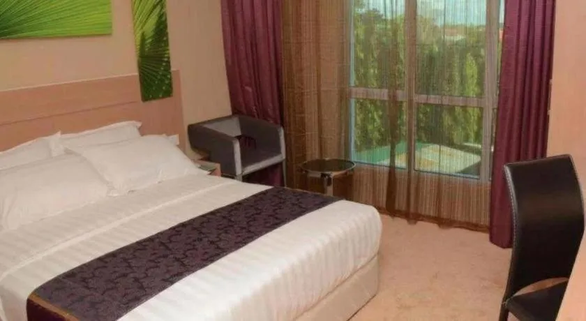 Bed in The Garden Boutique Hotel