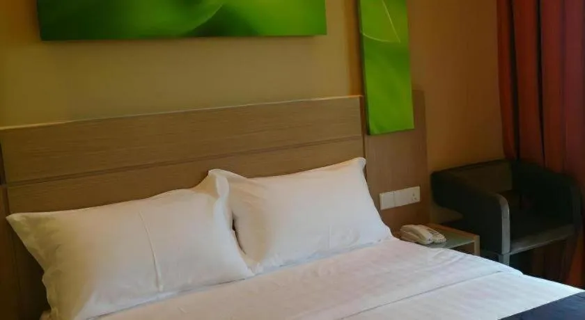 Bed in The Garden Boutique Hotel