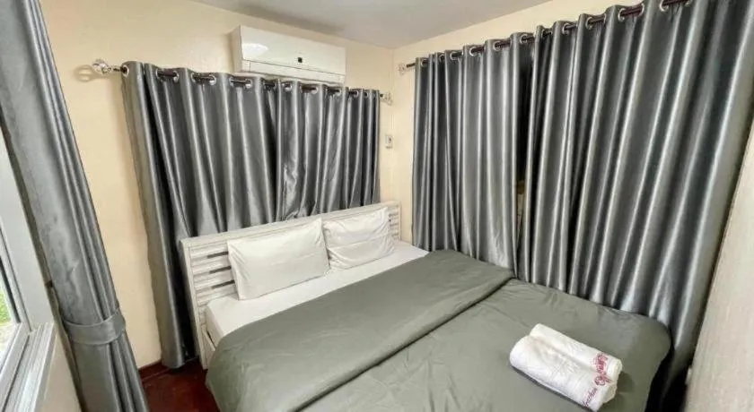 Bed in KK Riverside Resort