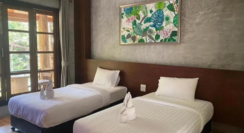 Bed in Khaopubpa Resort