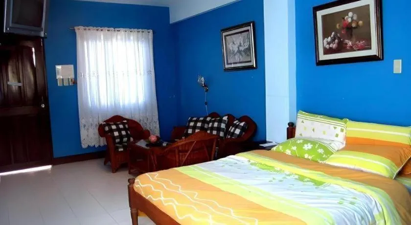 Bed in Tamaraw Beach Resort