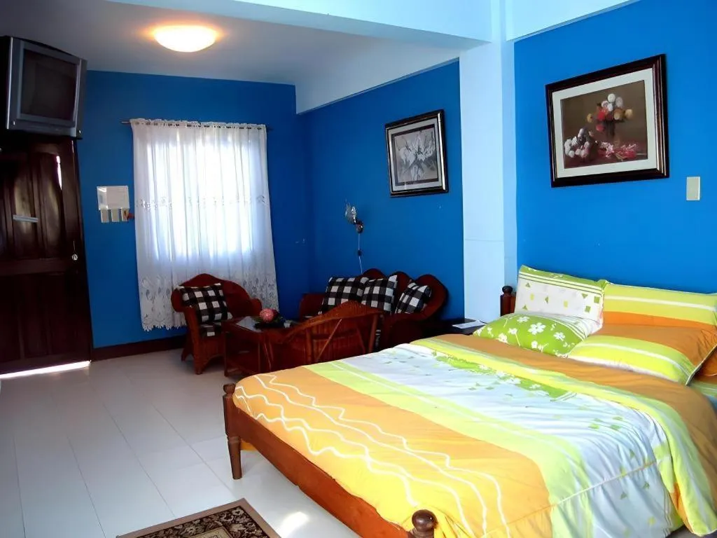 Bed in Tamaraw Beach Resort