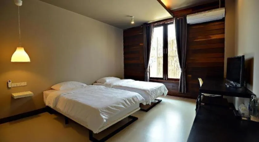 Bed in Sabye D Resort at Surat