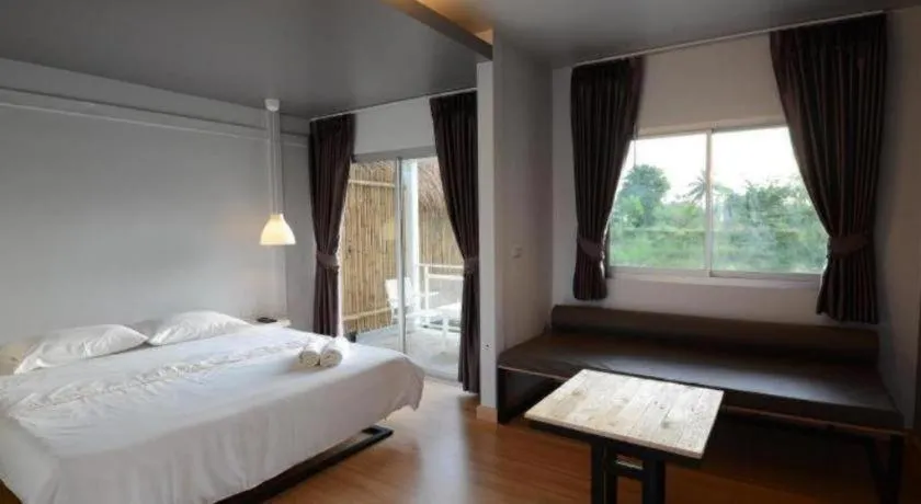 Bed in Sabye D Resort at Surat