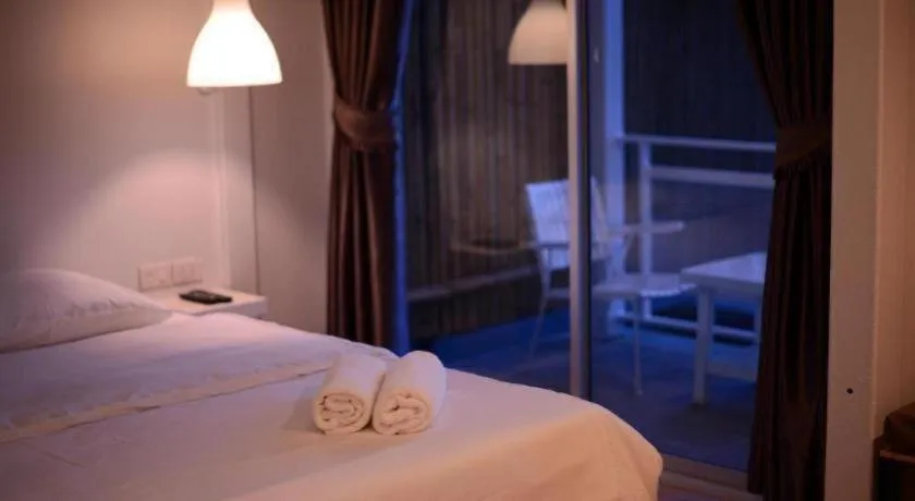 Bed in Sabye D Resort at Surat