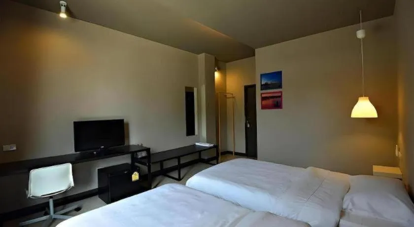 Bed in Sabye D Resort at Surat