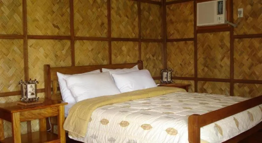 Bed in Sanctuary Garden Resort