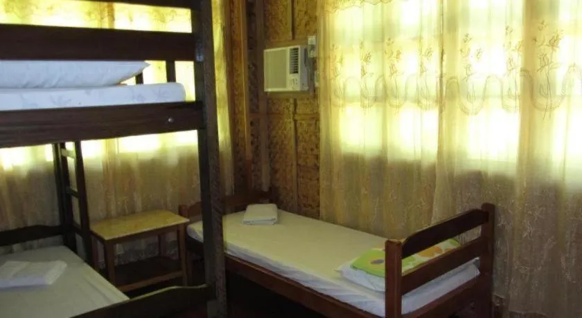 Bed in Sanctuary Garden Resort