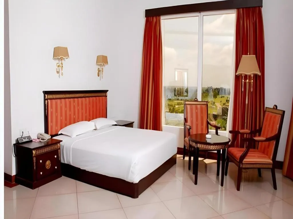 Bed in Pragati Green Meadows and Resort